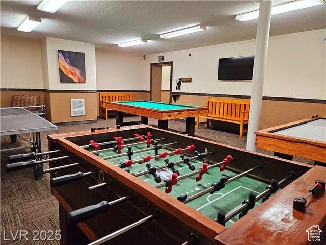223 Hunter Ridge Rd Unit E121, Brian Head, UT 84719 - game room featuring carpet and a textured ceiling
