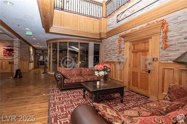 223 Hunter Ridge Rd Unit E121, Brian Head, UT 84719 - building lobby featuring a wainscoted wall, crown molding, and recessed lighting