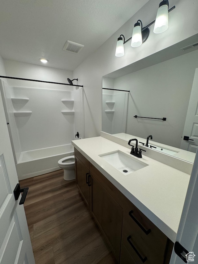 4687 S Roger View Ln Unit 8, West Valley City, UT 84119 - bathroom with vanity,  shower combination, wood finished floors, and recessed lighting