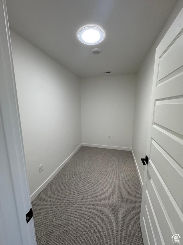 4687 S Roger View Ln Unit 8, West Valley City, UT 84119 - empty room featuring carpet floors and baseboards