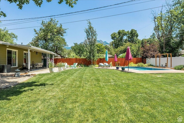 1680 E Fieldcrest Ln, Holladay, UT 84117 - fenced backyard with a patio