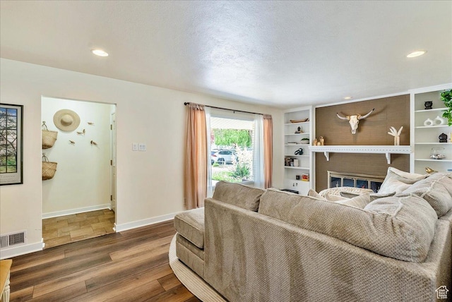 1680 E Fieldcrest Ln, Holladay, UT 84117 - living room with wood finished floors and recessed lighting