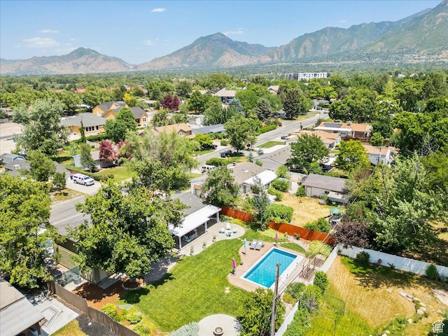1680 E Fieldcrest Ln, Holladay, UT 84117 - aerial perspective of suburban area with a mountain backdrop and a pool area
