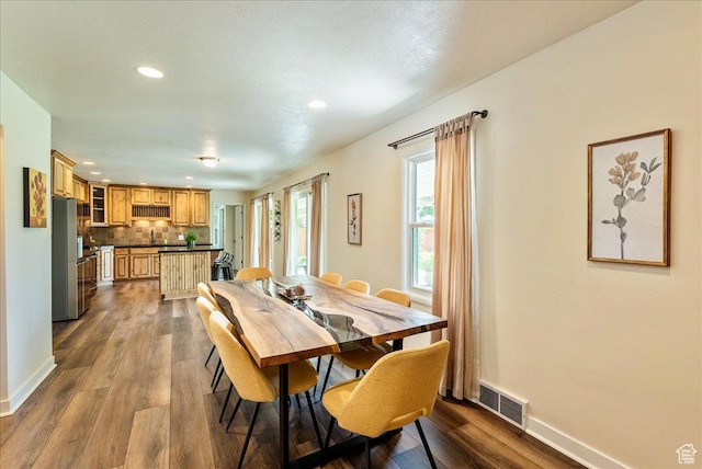 1680 E Fieldcrest Ln, Holladay, UT 84117 - dining room featuring recessed lighting and dark wood-type flooring