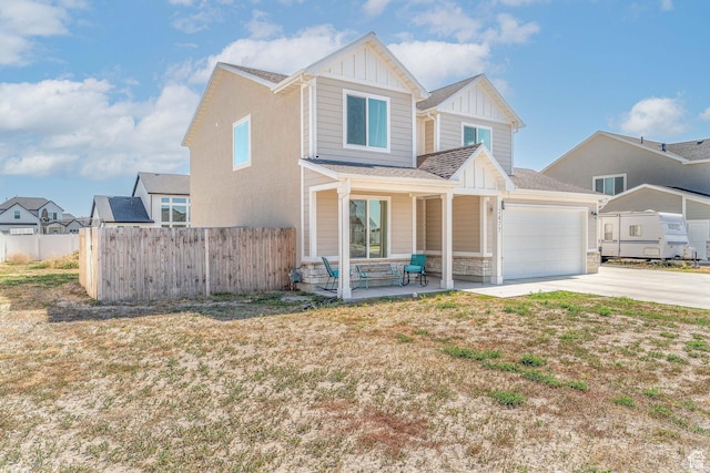 2477 W 2900 N, Farr West, UT 84404 - view of front of home featuring board and batten siding, concrete driveway, a garage, and roof with shingles