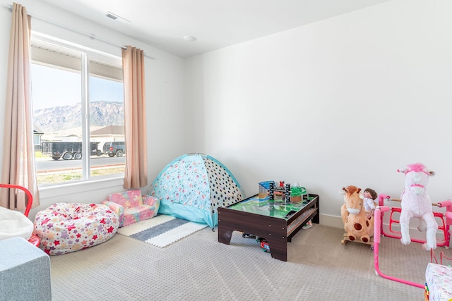 2477 W 2900 N, Farr West, UT 84404 - playroom with a mountain view and carpet floors