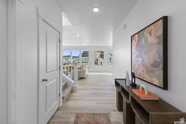 2477 W 2900 N, Farr West, UT 84404 - hallway with light wood finished floors, stairs, and recessed lighting