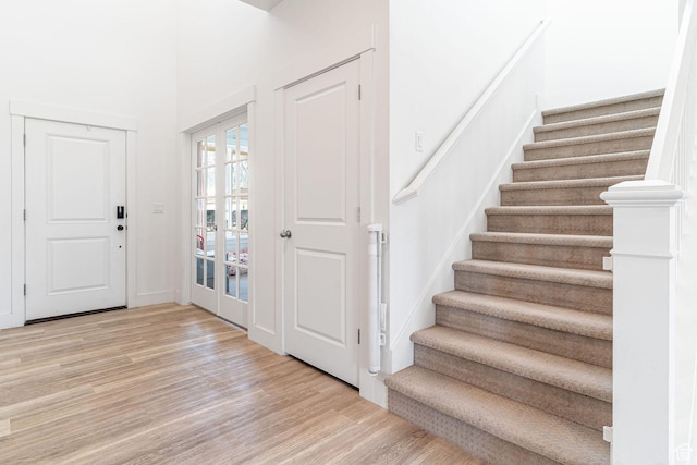2477 W 2900 N, Farr West, UT 84404 - foyer featuring wood finished floors, stairway, and french doors