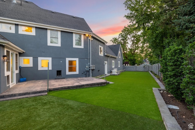 6273 S Oakcrest Cir, Holladay, UT 84121 - back of property with a patio, stucco siding, and a fenced backyard
