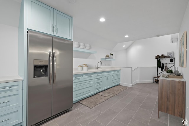 6273 S Oakcrest Cir, Holladay, UT 84121 - kitchen with stainless steel refrigerator with ice dispenser, open shelves, light countertops, recessed lighting, and blue cabinets