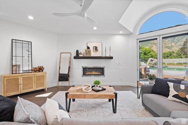 6273 S Oakcrest Cir, Holladay, UT 84121 - living area with recessed lighting, a glass covered fireplace, dark wood-style floors, and ceiling fan