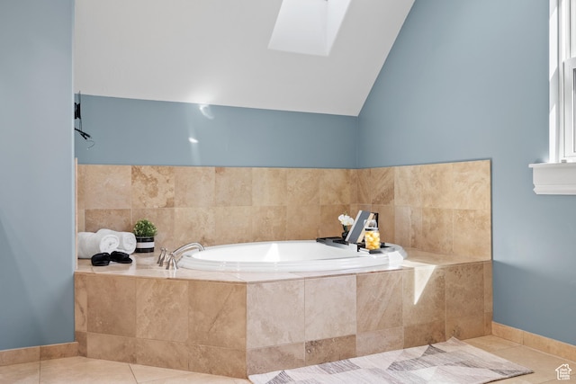 6273 S Oakcrest Cir, Holladay, UT 84121 - full bathroom featuring tile patterned flooring, a garden tub, a skylight, and lofted ceiling