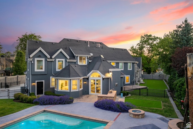 6273 S Oakcrest Cir, Holladay, UT 84121 - back of property featuring a fire pit, stucco siding, and a patio