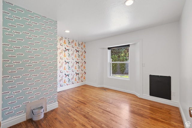 6273 S Oakcrest Cir, Holladay, UT 84121 - empty room with wood finished floors and recessed lighting