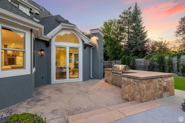 6273 S Oakcrest Cir, Holladay, UT 84121 - patio terrace at dusk featuring exterior kitchen and a patio