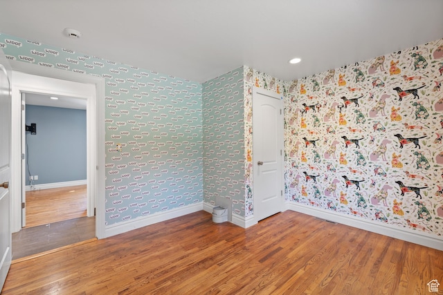 6273 S Oakcrest Cir, Holladay, UT 84121 - spare room featuring wallpapered walls, wood finished floors, a smoke detector, and recessed lighting