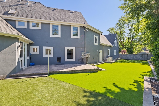 6273 S Oakcrest Cir, Holladay, UT 84121 - rear view of house with stucco siding, a patio area, and a shingled roof