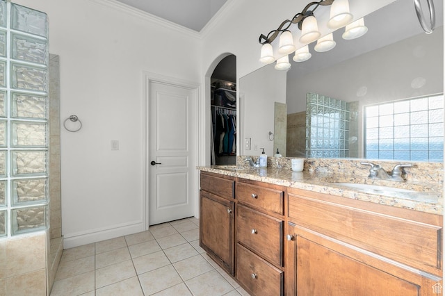 1524 E 330 N, Lehi, UT 84043 - bathroom featuring ornamental molding, walk in shower, double vanity, tile patterned flooring, and a walk in closet