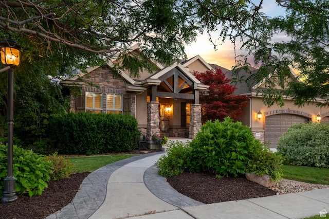 1524 E 330 N, Lehi, UT 84043 - craftsman house featuring stone siding, an attached garage, and stucco siding