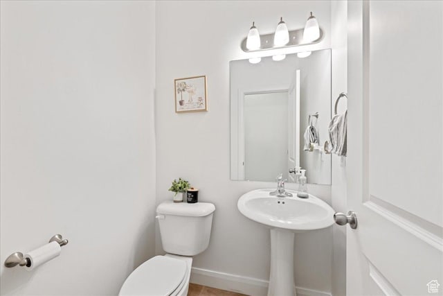 6029 S Carnelian Pkwy, St George, UT 84790 - bathroom with toilet and baseboards