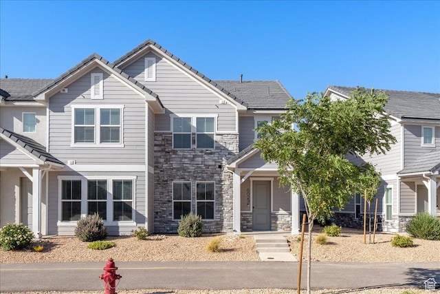 6029 S Carnelian Pkwy, St George, UT 84790 - view of front of property featuring stone siding and a tiled roof