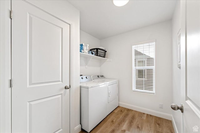 6029 S Carnelian Pkwy, St George, UT 84790 - laundry room with washer and dryer and light wood-type flooring