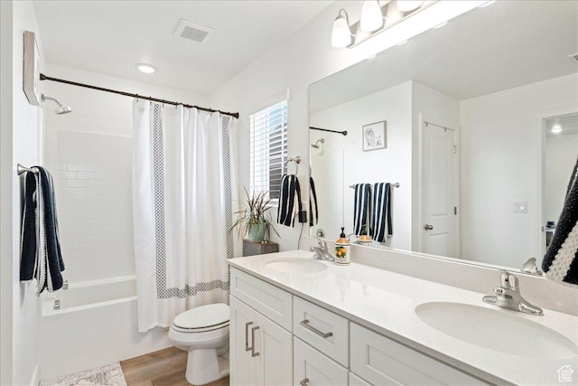 6029 S Carnelian Pkwy, St George, UT 84790 - full bathroom with wood finished floors, shower / bath combination with curtain, and double vanity
