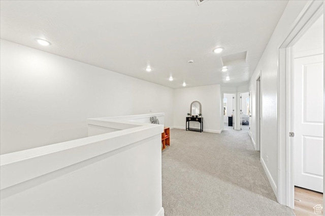 6029 S Carnelian Pkwy, St George, UT 84790 - hallway featuring attic access, light colored carpet, and recessed lighting