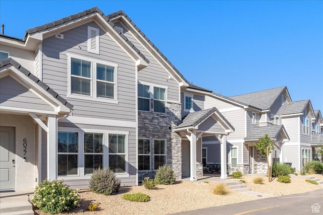 6029 S Carnelian Pkwy, St George, UT 84790 - view of front facade featuring stone siding and covered porch