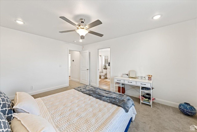 6029 S Carnelian Pkwy, St George, UT 84790 - bedroom featuring light colored carpet, recessed lighting, a ceiling fan, and ensuite bath