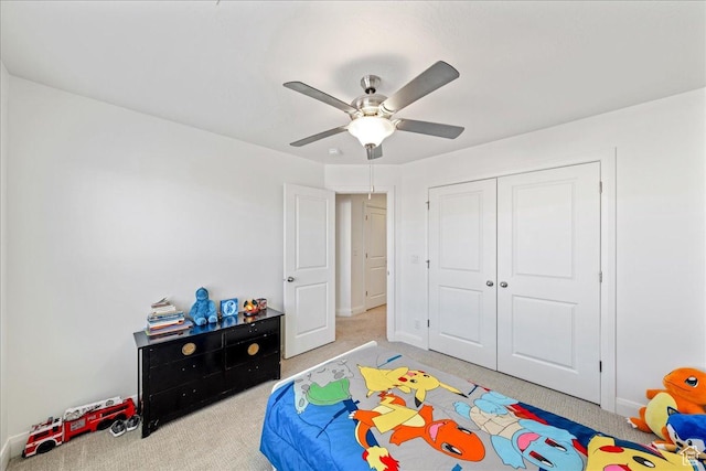 6029 S Carnelian Pkwy, St George, UT 84790 - bedroom featuring light colored carpet, a closet, and ceiling fan