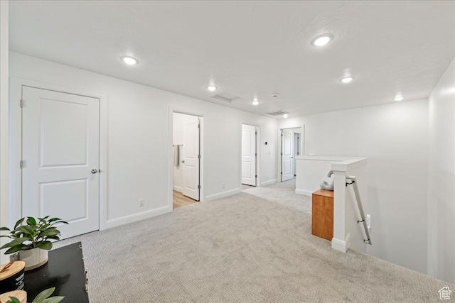 6029 S Carnelian Pkwy, St George, UT 84790 - spare room featuring light colored carpet and recessed lighting