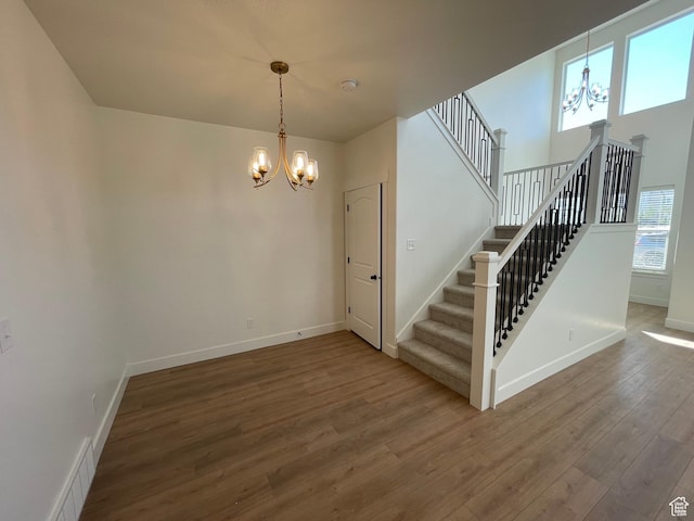4332 W Watchmen Way, Herriman, UT 84096 - stairs with a chandelier and wood finished floors