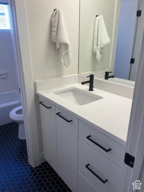 1014 W Bloomington Dr S, St George, UT 84790 - bathroom featuring vanity and tile patterned flooring