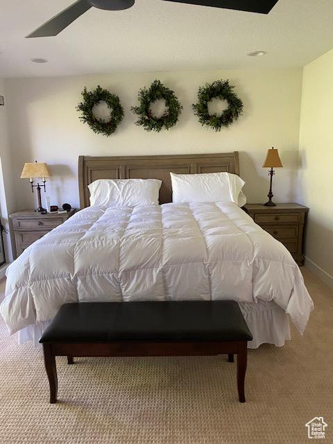 1014 W Bloomington Dr S, St George, UT 84790 - bedroom with light carpet and baseboards