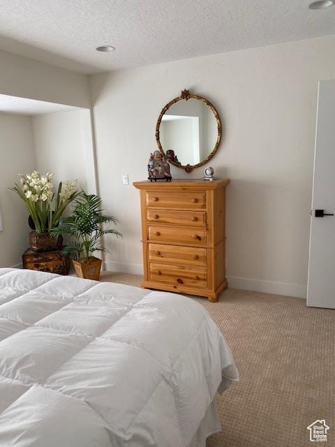 1014 W Bloomington Dr S, St George, UT 84790 - bedroom with light carpet and a textured ceiling