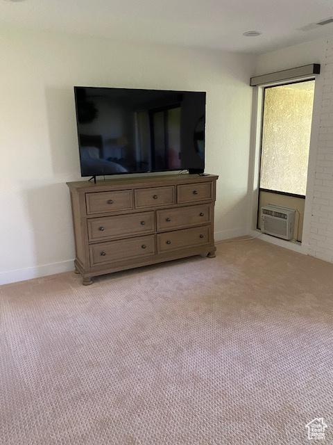 1014 W Bloomington Dr S, St George, UT 84790 - bedroom with light colored carpet and an AC wall unit