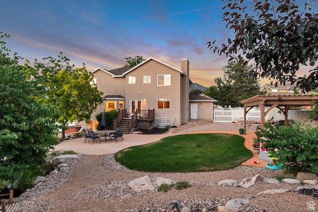14012 S Osborne Ln E, Draper, UT 84020 - back of house with a patio, a deck, and stucco siding