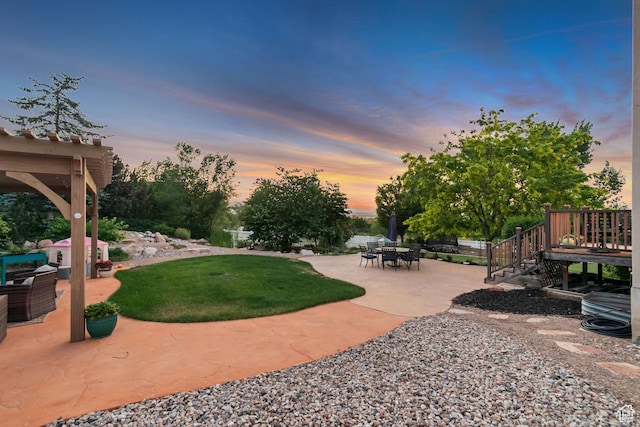 14012 S Osborne Ln E, Draper, UT 84020 - yard at dusk featuring a patio area, a yard, and a wooden deck