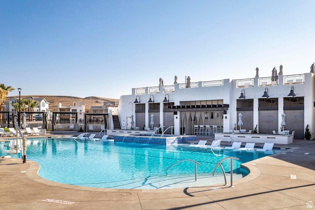 5599 S Carnelian Pkwy Unit 205, St George, UT 84790 - community pool with a patio area