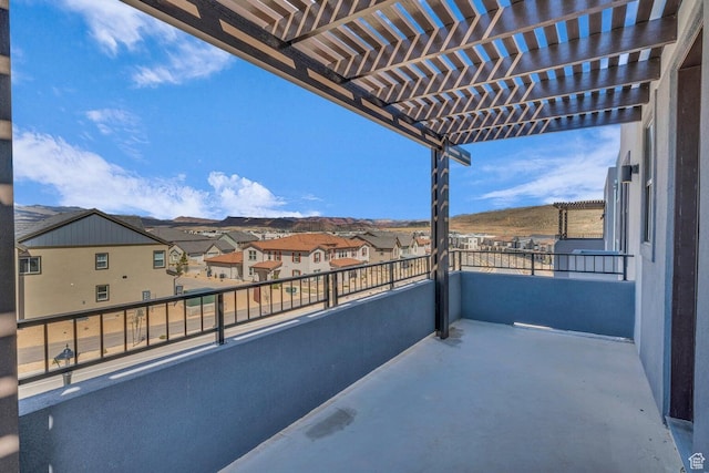 5599 S Carnelian Pkwy Unit 205, St George, UT 84790 - balcony featuring a pergola and a residential view