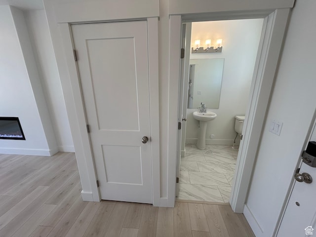 564 N 800 W, Smithfield, UT 84335 - bathroom with baseboards and wood finished floors