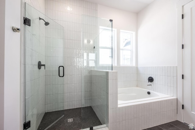 424 W Ascent Dr Unit 254, Hideout, UT 84036 - bathroom featuring a shower stall, a bath, and tile patterned floors