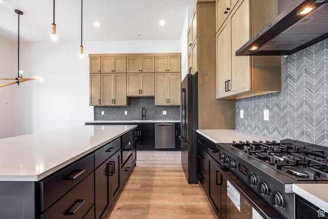 424 W Ascent Dr Unit 254, Hideout, UT 84036 - kitchen featuring extractor fan, stove, freestanding refrigerator, light countertops, and recessed lighting