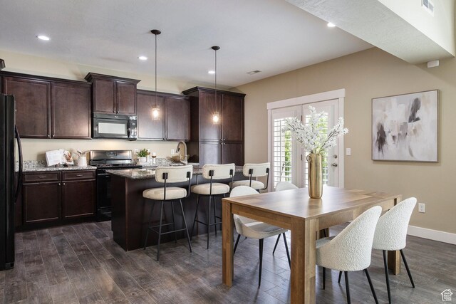 7902 S Farm House Ln E, Midvale, UT 84047 - dining room with dark wood-type flooring and recessed lighting