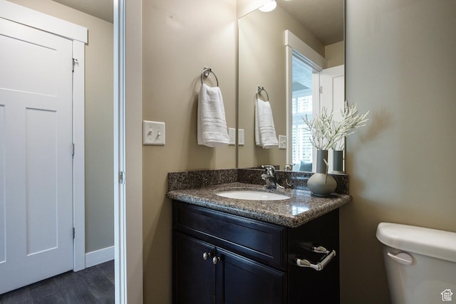 7902 S Farm House Ln E, Midvale, UT 84047 - bathroom with vanity and wood finished floors