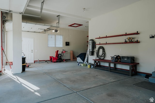 1628 E Lone Oak Dr, Draper, UT 84020 - garage with a central vacuum unit and a garage door opener