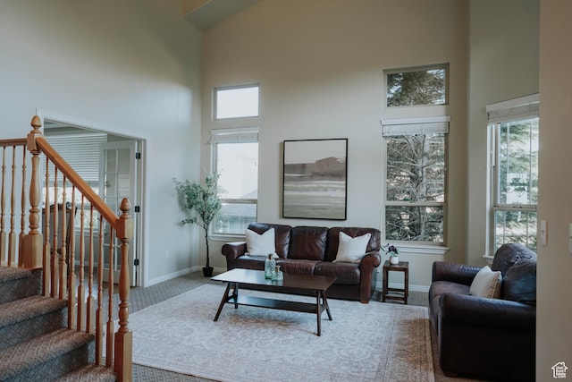 1628 E Lone Oak Dr, Draper, UT 84020 - living room with a towering ceiling, carpet, and stairway