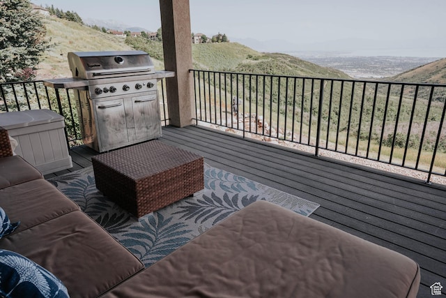 1628 E Lone Oak Dr, Draper, UT 84020 - wooden deck with area for grilling and a mountain view