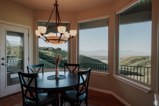 1628 E Lone Oak Dr, Draper, UT 84020 - dining room with dark wood-style flooring, plenty of natural light, and a mountain view